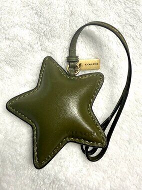 Like new Coach puffy olive star. Fast shipper.